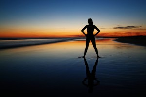 girl on beach at sunrise